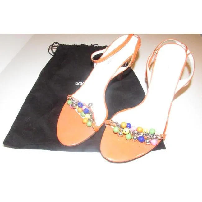 Dolce & Gabbana, new/unworn, dressier, strappy sandals or heels made of tangerine orange leather with colorful beads