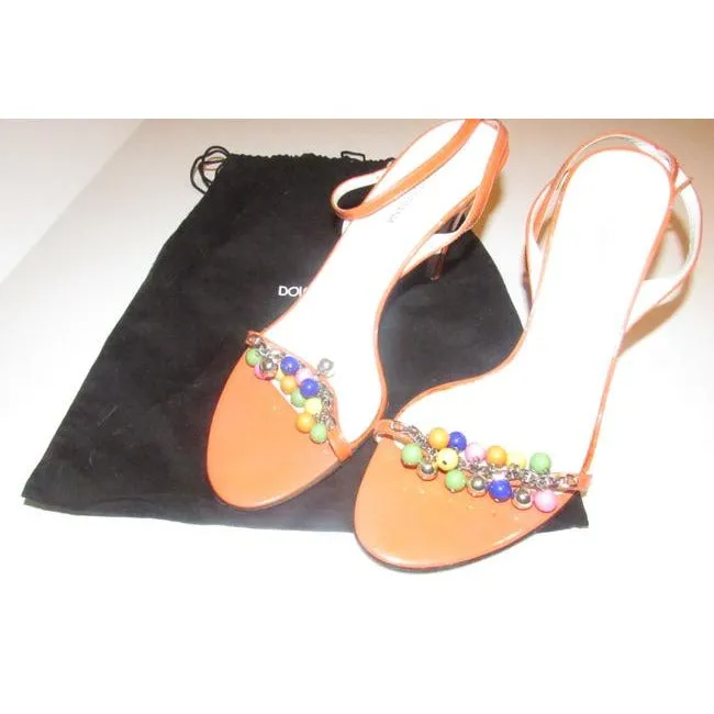 Dolce & Gabbana, new/unworn, dressier, strappy sandals or heels made of tangerine orange leather with colorful beads